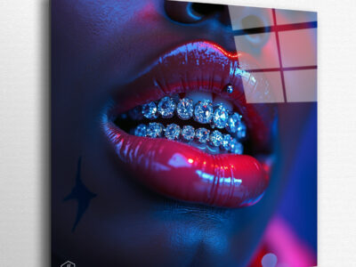 Glossy tattooed lips with diamond grills sparkling under neon stage lights.