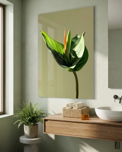 A bird of paradise leaf and its emerging bloom rise in soft daylight, sculptural and freshly green against a quiet sage backdrop.