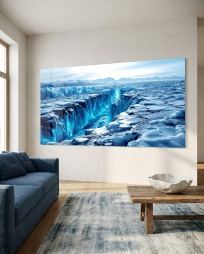 A glowing crevasse splits an immense field of sculpted ice, its sapphire fissure cutting through a frozen plain toward distant pale mountains.