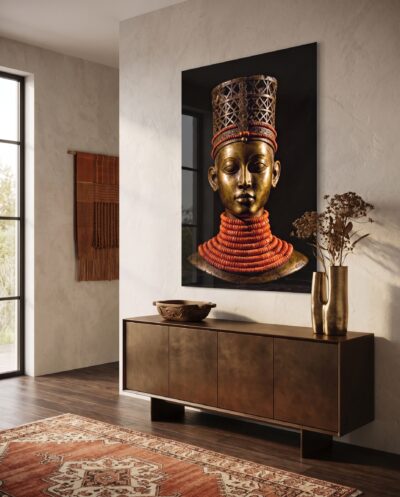 A serene bronze altar head crowned with a towering openwork headdress, its shoulders wrapped in tier upon tier of coral-red beads against velvet black.