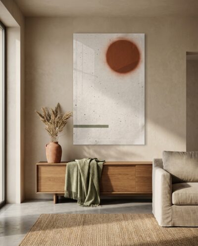 A single rust-red disc rides high in a field of warm, speckled paper, quietly grounded by one slim olive bar below.