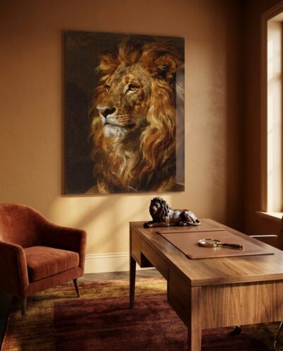A tawny lion's head sits calm and monumental, its mane a swirl of cognac and gold against warm darkness.