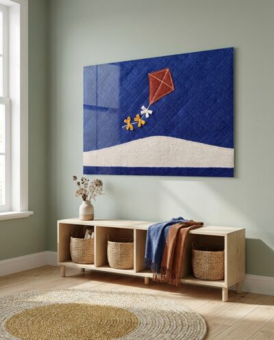 A terracotta diamond kite trails tiny mustard bows across an expansive, quilted cobalt sky and soft oatmeal dune.